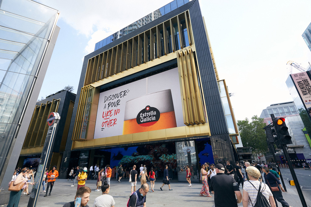 Estrella Galicia banner on the outside of The Now Building