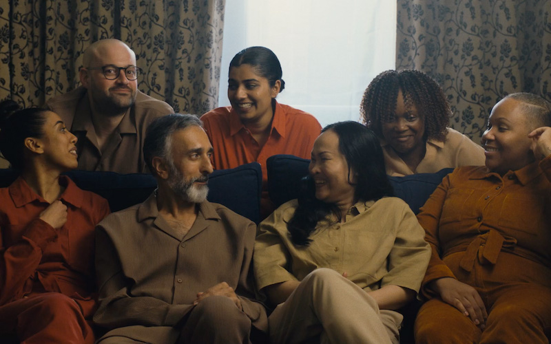 Photo of NHS workers sitting on a sofa