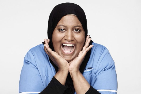 Portrait of NHS worker in uniform by Rankin